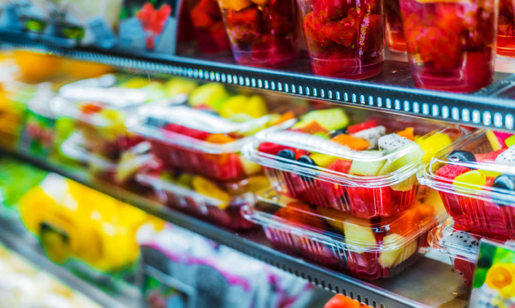 Fruit in Clear Packaging on Store Shelf Image